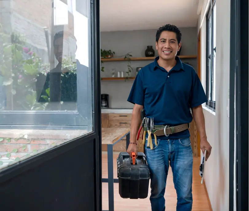 Worker arriving for house repair